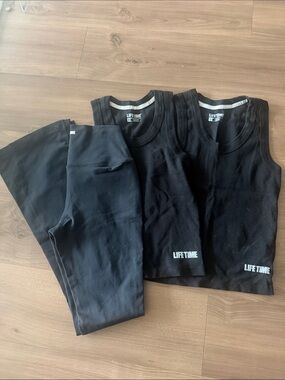 Woman’s Black Active Tank Tops & Leggings Set from Life Time .